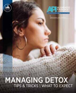 Cover of the Alvarado Parkway Institute brochure "Managing Detox: Tips & Tricks | What to Expect," showing a woman in a knit sweater looking out a window.
